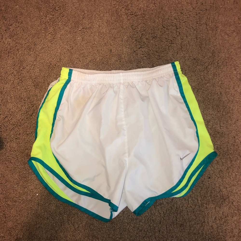 White and neon green Nike Tempo running shorts